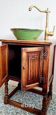 Bathroom vanity unit with sink and tap