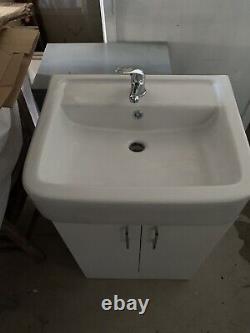 White bathroom vanity unit with sink & tap. Unused